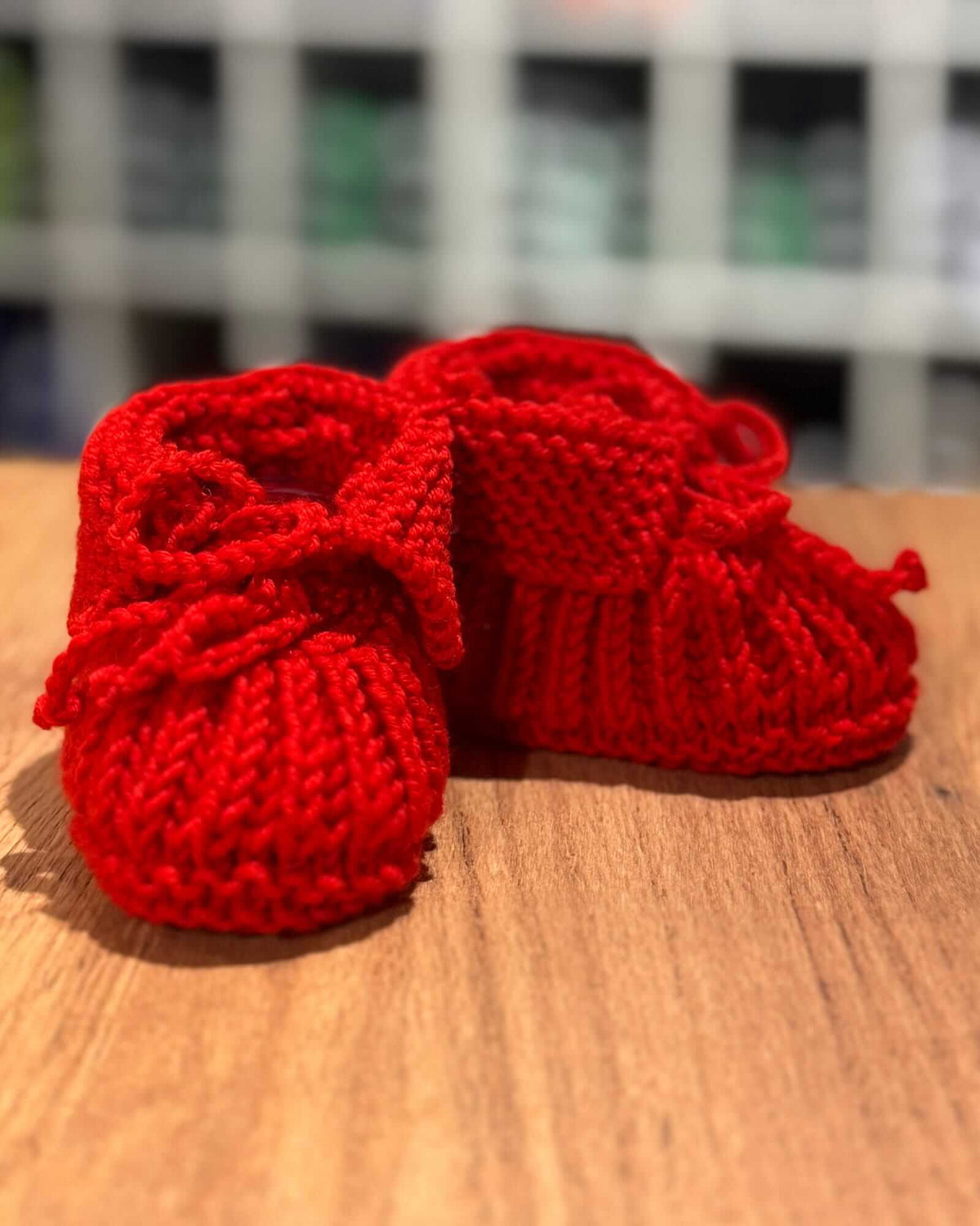 Chaussons pour bébé tricotés à la main, en Rouge – Mérinos (0 - 12 mois)